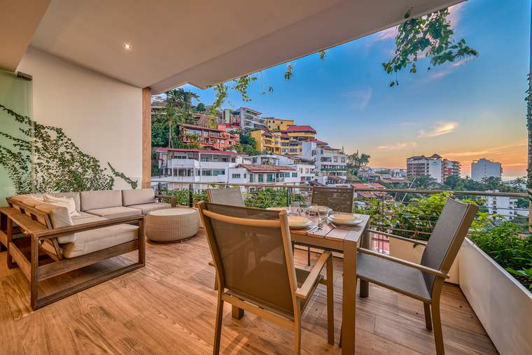 Terrace lounge with hillside views