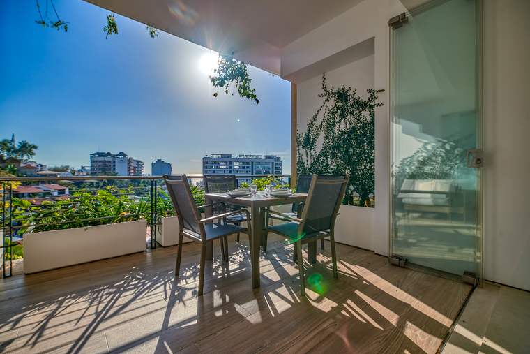 Terrace with city and ocean views