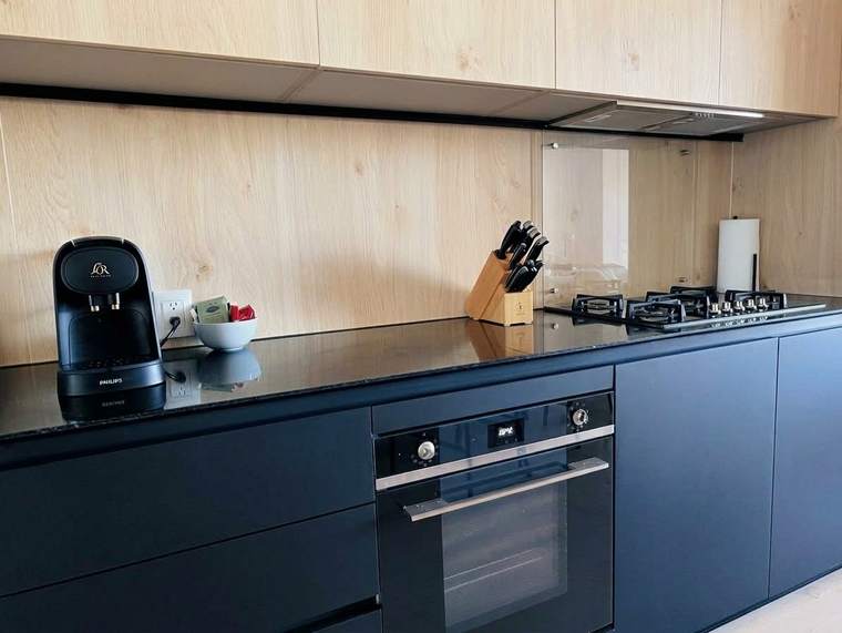 Kitchen with gas cooktop and oven